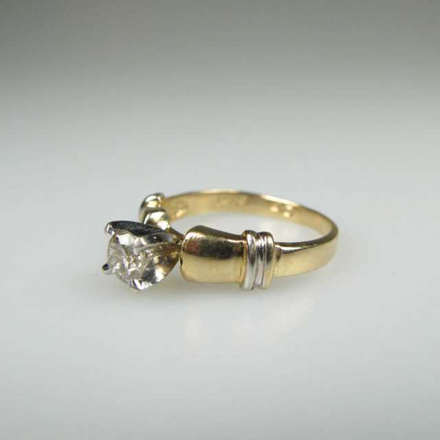 14k Yellow And White Gold Solitaire Ring set with a brilliant cut diamond (approx. 0.40ct.)