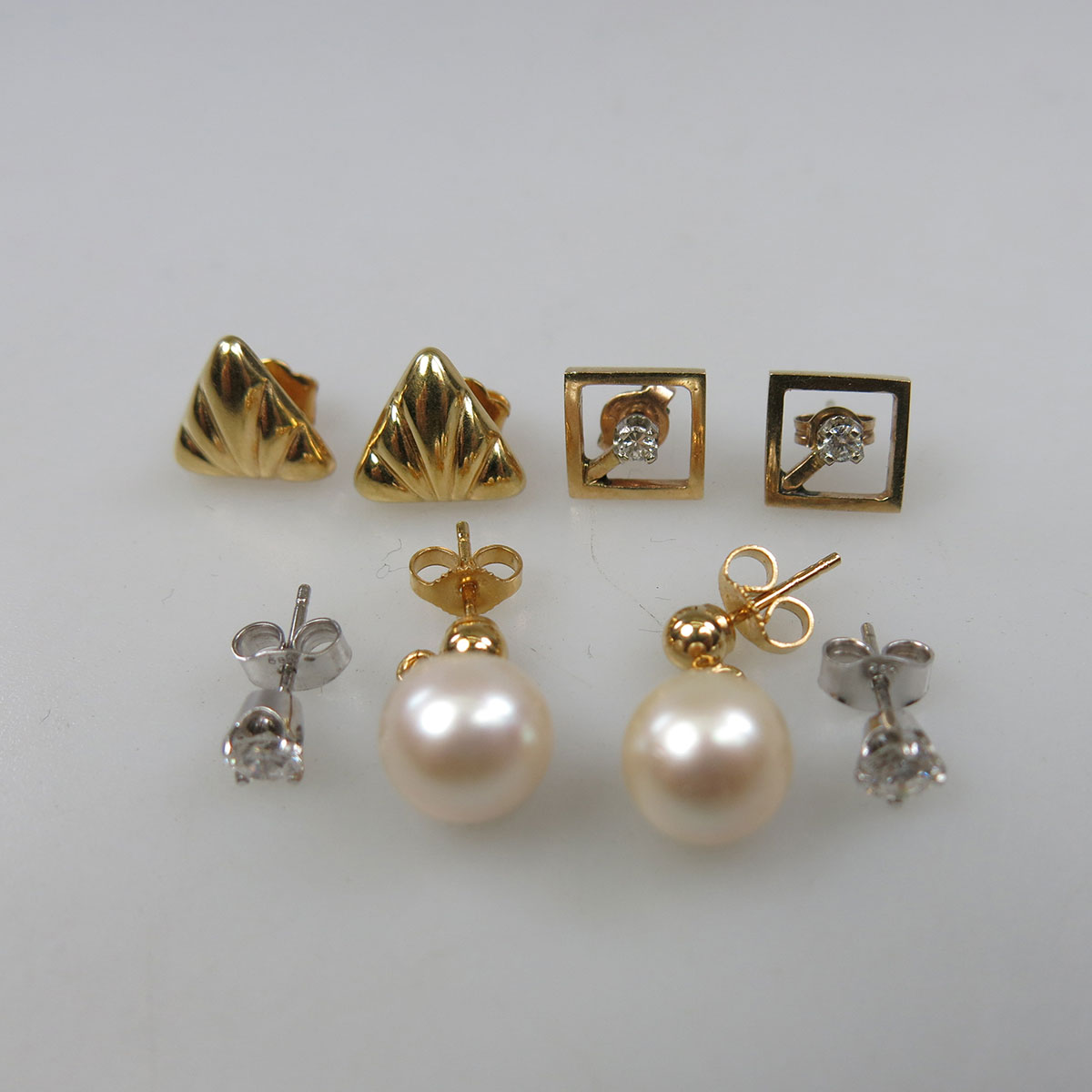 4 Pairs Of Gold Earrings